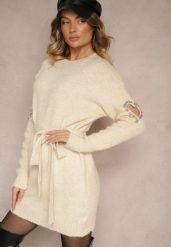 Beżowa Sukienka Sweterkowa z Wełną Ozdobiona Cyrkoniami Paskiem i Wycięciami Zolida. Brązowe sukienki damskie Renee, na co dzień, bez wzorów, z wełny, eleganckie, bez kołnierzyka, bez ramiączek, mini, dopasowane. W wyprzedaży za 135.99 zł.