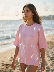 Bawełniana koszulka z haftowanym napisem Maldives - różowy. Czerwone t-shirty damskie Sinsay, l, bez wzorów, z bawełny, bez kołnierzyka. Za 29.99 zł.