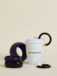 Okrągłe kolczyki - ciemnobrązowy. Brązowe kolczyki damskie Reserved. W wyprzedaży za 49.99 zł.