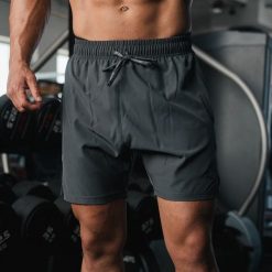 Premium Active Short - Spodnie sportowe. Czarne spodnie sportowe męskie REEVA, z tkaniny. Za 199.00 zł.