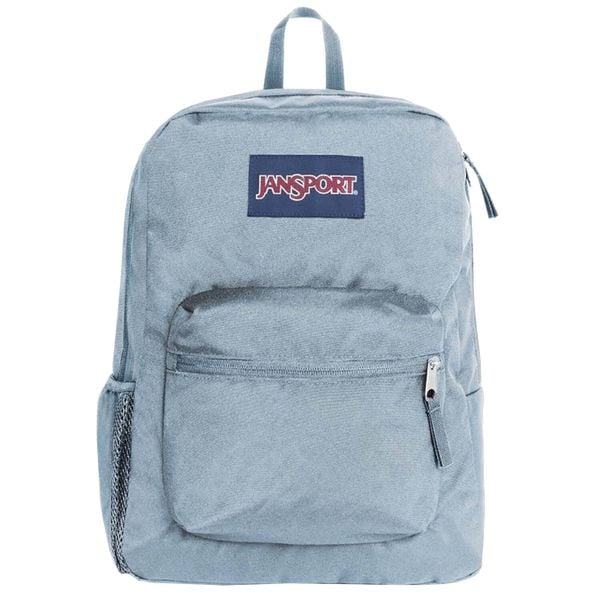Plecak sportowo-turystyczny damski Cross Town Backpack pojemność 26 L. Niebieskie plecaki damskie JanSport, bez wzorów, z materiału, sportowe. Za 129.99 zł.