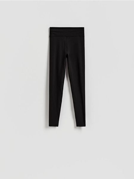 Gładkie legginsy - czarny. Czarne legginsy damskie Reserved, l, bez wzorów, z dzianiny. W wyprzedaży za 65.99 zł.