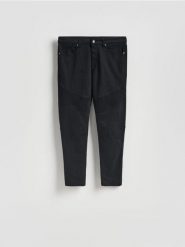 Bawełniane spodnie skinny - czarny. Czarne spodnie materiałowe męskie Reserved, bez wzorów, z bawełny. Za 149.99 zł.