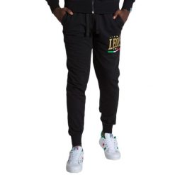 Męskie spodnie dresowe w kolorze złotym. Czarne spodnie dresowe męskie LEONE 1947 APPAREL, bez wzorów, z dresówki. Za 131.35 zł.