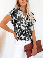Milan Kiss Bluzka w kolorze czarno-kremowym rozmiar: XL. Brązowe bluzki damskie Milan Kiss, xl, bez wzorów, bez kołnierzyka, bez ramiączek. Za 109.26 zł.