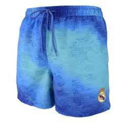 Spodenki kąpielowe królewskie Real Madryt z herbem. Niebieskie kąpielówki męskie Real Madrid, l, bez wzorów, z materiału, do piłki nożnej. Za 142.64 zł.