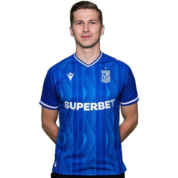Koszulka piłkarska Macron Lech Poznań 24/25. Białe t-shirty sportowe męskie Macron, m, z materiału, bez ramiączek, do piłki nożnej. Za 249.99 zł.