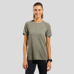 Koszulka damska Odlo ESSENTIAL SEAMLESS T-shirt crew neck l/s. Szare bluzki damskie Odlo, l, bez wzorów, sportowe, bez kołnierzyka, bez ramiączek. Za 270.59 zł.