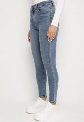 Niebieskie Jeansy o Kroju Skinny z Wysokim Stanem Solarie. Niebieskie spodnie dresowe damskie Born2be, l, bez wzorów, z bawełny. Za 99.99 zł.