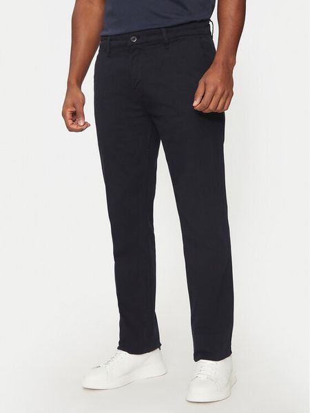 Guess Spodnie materiałowe M4BB16 WGHG1 Niebieski Regular Fit. Niebieskie spodnie materiałowe męskie Guess, z aplikacjami, z bawełny. Za 239.99 zł.