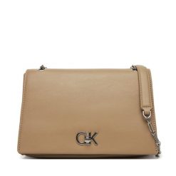 Torebka Calvin Klein. Brązowe torebki klasyczne damskie CALVIN KLEIN, bez wzorów, wizytowe, bez kołnierzyka, bez ramiączek. Za 349.99 zł.