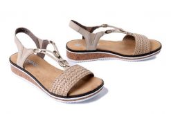 RIEKER V3662-62 beige, sandały damskie. Brązowe sandały damskie Rieker, bez wzorów, bez obcasa, na koturnie. Za 271.92 zł.