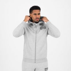 Bluza z kapturem męska Puma Gym & Pilates. Czarne bluzy sportowe męskie Puma, bez wzorów, z bawełny, sportowe, bez kołnierzyka, bez ramiączek. W wyprzedaży za 119.99 zł.