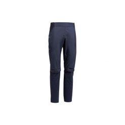 Spodnie turystyczne FH500 męskie. Niebieskie spodnie materiałowe męskie QUECHUA, bez wzorów, z elastanu. Za 149.99 zł.