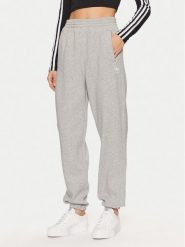 Adidas Spodnie dresowe Essentials Fleece IY9638 Szary Loose Fit. Szare spodnie dresowe damskie Adidas, l, bez wzorów, z bawełny. Za 238.99 zł.