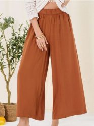 Wiskozowe spodnie culotte - żółty. Żółte spodnie materiałowe damskie Sinsay, bez wzorów, z wiskozy. Za 35.99 zł.