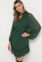 Ciemnozielona Rozkloszowana Sukienka z Falbanką Harlin. Zielone sukienki damskie Born2be, m, bez wzorów, bez kołnierzyka, bez ramiączek, mini, rozkloszowane. W wyprzedaży za 151.99 zł.