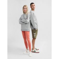 Luźna bluza z okrągłym dekoltem Hummel Bee. Szare bluzy sportowe damskie HUMMEL, bez wzorów, bez ramiączek, bez kaptura. W wyprzedaży za 132.00 zł.