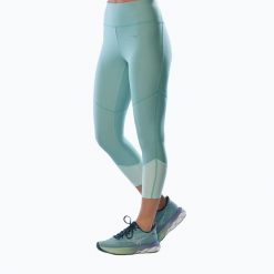 Legginsy damskie Mizuno Impulse Core 3/4. Niebieskie legginsy sportowe damskie Mizuno, s, bez wzorów, z elastanu, do biegania. Za 119.99 zł.
