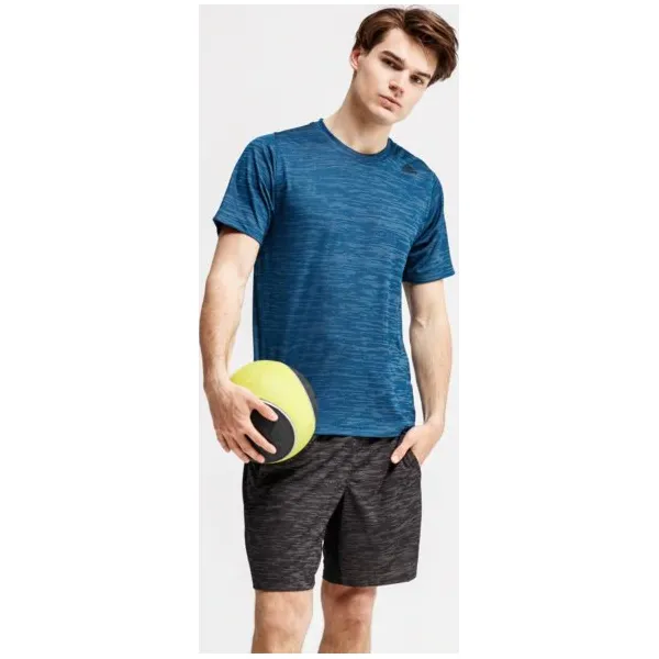 Adidas Koszulka Ss Fl Tec Z Ft Hea , niebieski, rozmiar XL. Niebieskie t-shirty sportowe męskie Adidas, m, z materiału, bez ramiączek, na fitness i siłownię. W wyprzedaży za 99.99 zł.