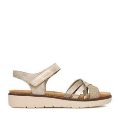 Sandały Remonte. Żółte sandały damskie Remonte, bez wzorów, bez obcasa, na płaskiej podeszwie. Za 339.99 zł.