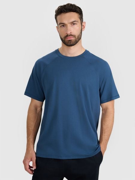 4F T-shirt oversize gładki męski - turkusowy S. Niebieskie t-shirty męskie 4f, m, z aplikacjami, z bawełny, bez kołnierzyka. W wyprzedaży za 59.99 zł.