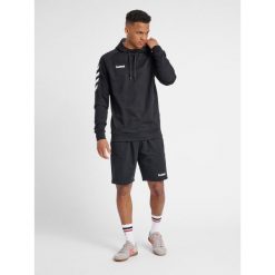 Bluza sportowa z kapturem męska Hummel Go Cotton Hoodie. Niebieskie bluzy sportowe męskie HUMMEL, bez wzorów, sportowe, bez kołnierzyka, bez ramiączek. Za 168.00 zł.