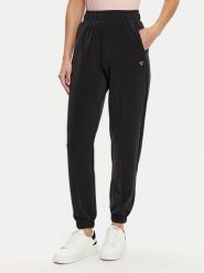 Guess Spodnie dresowe V5RB11 KCAY2 Czarny Regular Fit. Czarne spodnie dresowe damskie Guess, xl, z aplikacjami, z dresówki. Za 239.99 zł.