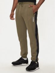 Guess Spodnie dresowe Z2YB09 KB3P2 Zielony Regular Fit. Zielone spodnie dresowe męskie Guess, z aplikacjami, z bawełny. Za 239.99 zł.