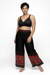 Damskie Spodnie palazzo obszycie szeroka nogawka elastyczny pas. Czarne spodnie materiałowe damskie Ulla Popken, bez wzorów, z materiału, boho, plus size. Za 239.99 zł.