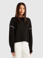 Benetton Sweter w kolorze czarnym rozmiar: L. Czarne swetry klasyczne damskie Benetton, l, z wełny, bez kołnierzyka. Za 145.26 zł.