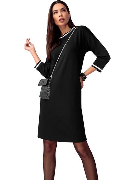 Heine Sukienka w kolorze czarnym rozmiar: 36. Czarne sukienki damskie Heine, na co dzień, bez wzorów, bez kołnierzyka, bez ramiączek, midi, proste. Za 100.28 zł.