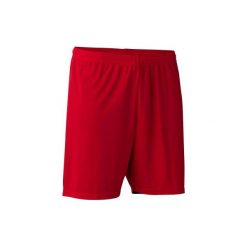 Spodenki do piłki nożnej F100. Czerwone szorty męskie KIPSTA, bez wzorów, z materiału. Za 19.99 zł.