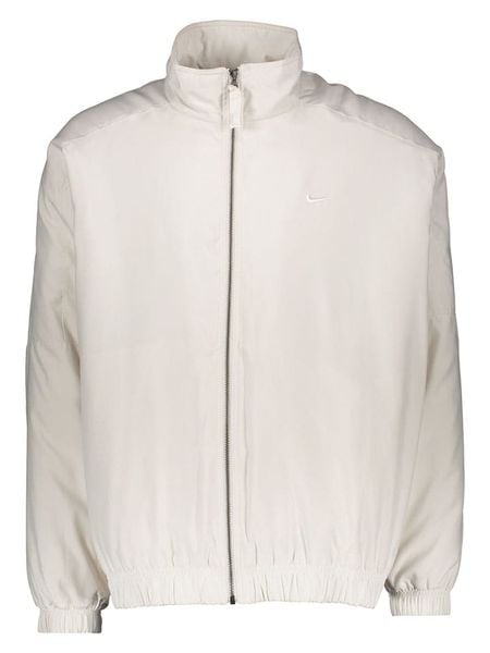 Nike Kurtka w kolorze kremowym rozmiar: XL. Brązowe kurtki damskie Nike, xl, bez wzorów, bez kaptura. Za 230.59 zł.