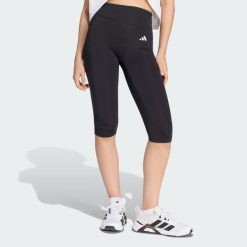 Legginsy Optime Essentials Capri. Czarne legginsy damskie Adidas, l, bez wzorów, z elastanu. Za 199.00 zł.