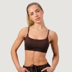 Biustonosz damski sportowy bezszwowy Mocha NEO. Brązowe biustonosze sportowe damskie GYMBEAM, bez wzorów, z elastanu. Za 85.90 zł.