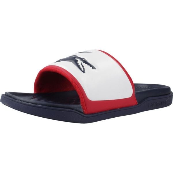 Klapki Lacoste Model Serve Slide Dual Kolor Niebieski. Niebieskie klapki i japonki męskie Lacoste, z syntetyku. Za 333.75 zł.