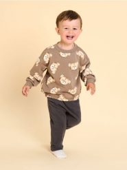Bawełniany komplet: bluza i spodnie - wielobarwny. Bluzy i bluzki niemowlęce Sinsay, bez wzorów, z bawełny, bez ramiączek, bez kaptura. Za 35.99 zł.