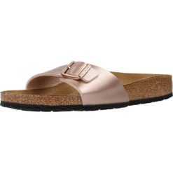 Klapki damskie Birkenstock Madrid. Żółte klapki damskie Birkenstock, bez wzorów, z materiału, bez obcasa. Za 279.00 zł.