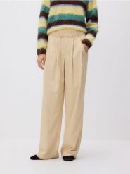 Spodnie z paskiem - jasnożółty. Żółte spodnie materiałowe damskie Reserved, bez wzorów, z tkaniny. Za 199.99 zł.