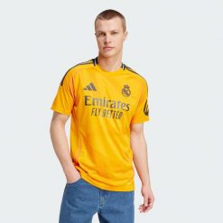Koszulka Real Madrid 24/25 Away. Brązowe t-shirty sportowe męskie Adidas, l, z materiału, bez ramiączek, do piłki nożnej. W wyprzedaży za 307.30 zł.