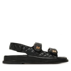 Sandały Nine West. Czarne sandały damskie Nine West, bez wzorów, bez obcasa, na płaskiej podeszwie. Za 279.99 zł.