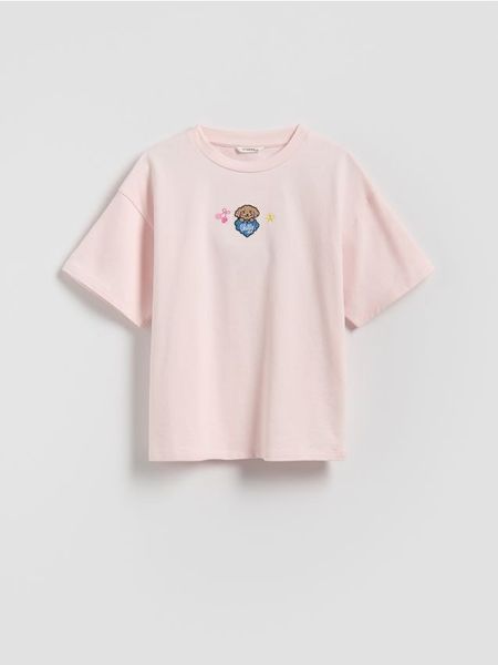 Bawełniany t-shirt z aplikacją Boffie & Poko - pastelowy róż. Czerwone koszulki dziewczęce Reserved, z aplikacjami, z bawełny, bez ramiączek. Za 39.99 zł.