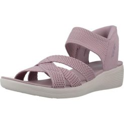 Sandały SKECHERS SLIP-INS ARYA Fioletowy. Fioletowe sandały damskie Skechers, bez wzorów, z tkaniny, bez obcasa. Za 490.00 zł.