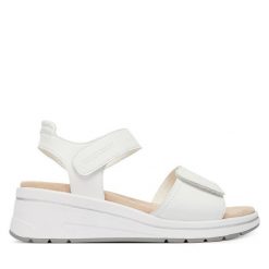 Sandały Caprice. Białe sandały damskie Caprice, bez wzorów, bez obcasa, na koturnie. Za 329.99 zł.