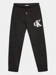 Calvin Klein Jeans Spodnie dresowe Metallic IG0IG02287 Czarny Regular Fit. Czarne spodnie dziewczęce Calvin Klein Jeans, z bawełny. Za 209.99 zł.