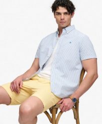 Superdry Szorty chino Premium Regular slim – Washed Yellow. Żółte szorty męskie Superdry., bez wzorów, z bawełny, klasyczne. Za 250.50 zł.