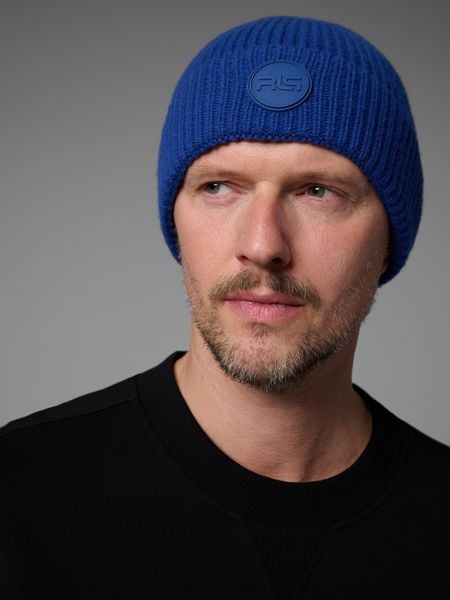 4F Czapka beanie wełniana 4F x Robert Lewandowski - granatowa L. Niebieskie czapki męskie 4f, na zimę, bez wzorów, z dzianiny, klasyczne. Za 99.99 zł.