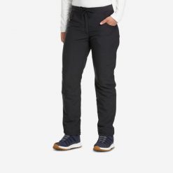 Spodnie turystyczne damskie Quechua NH100 Warm. Czarne spodnie dresowe damskie QUECHUA, l, bez wzorów, z materiału. Za 129.99 zł.