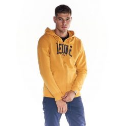 Męska zapinana na zamek bluza z kapturem Leone 1947 Apparel. Żółte bluzy sportowe męskie LEONE 1947 APPAREL, bez wzorów, z tkaniny, sportowe, bez kołnierzyka, bez ramiączek. W wyprzedaży za 154.80 zł.